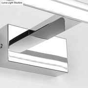Modern geometric chrome vanity light fixture with sleek angular design wall-mounted for bathroom use