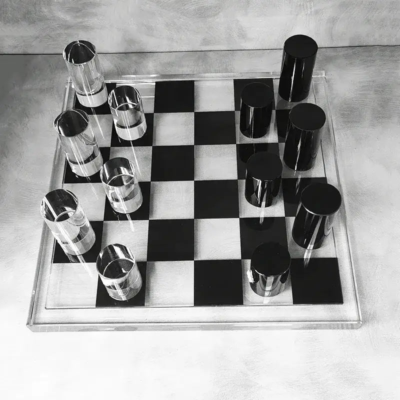Modern geometric crystal chess set with clear acrylic board and cylindrical black and transparent pieces for living room decorbites geometric crystal decor