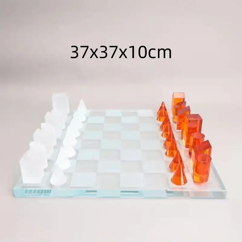 Modern geometric crystal chess set with white and orange translucent acrylic pieces on clear checkered board decorbites geometric crystal