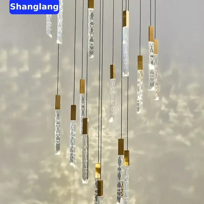 Modern geometric crystal chrome led chandelier featuring clear acrylic pendants with gold-toned caps for living room decorbites crystal chrome lighting