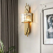 Modern geometric crystal gold wall lamp with vertical crystal accents in gold-toned metal for living room decorbites crystal gold
