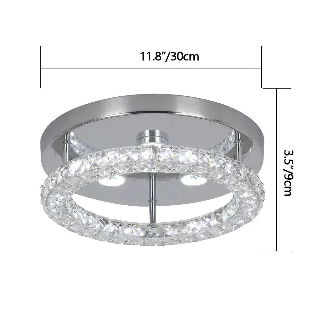A modern geometric crystal smart led chandelier ceiling light with sleek chrome finish and clear faceted crystals