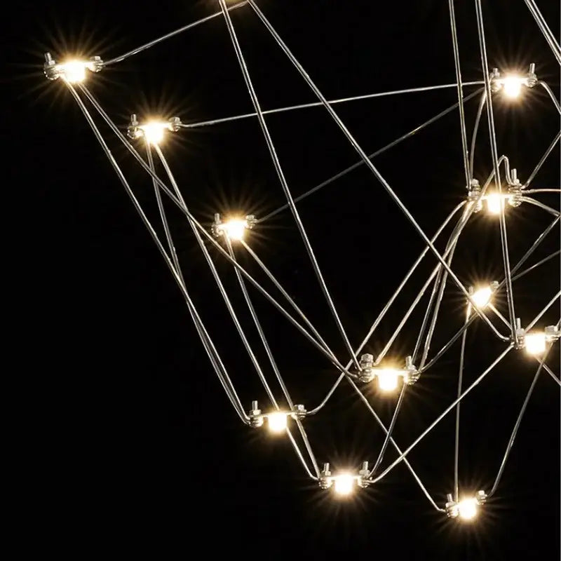 Modern geometric cube light pendant lamp featuring slender metallic rods and starburst led lights for dining room decorbites cube light