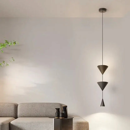 Modern geometric decorbites cone long led pendant bedroom light with three stacked matte black conical shades suspended by thin cord