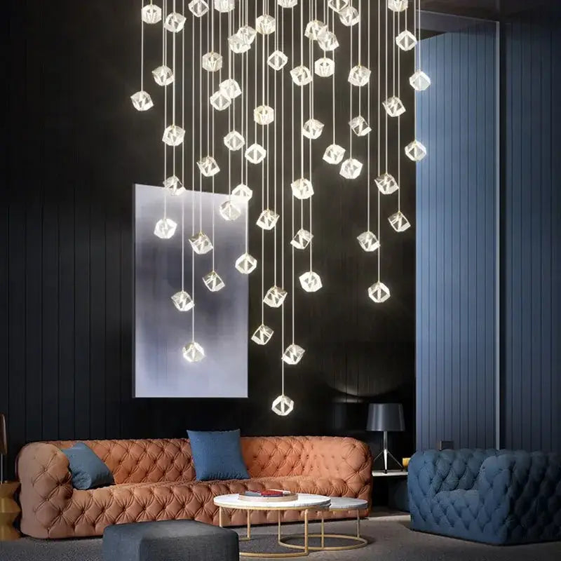 A modern decorbites crystal led chandelier with transparent faceted geometric pendants for staircase lighting