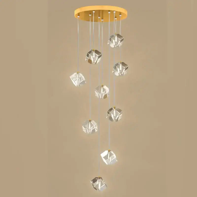 Modern geometric decorbites crystal led chandelier with warm gold circular ceiling mount and clear faceted pendant lights