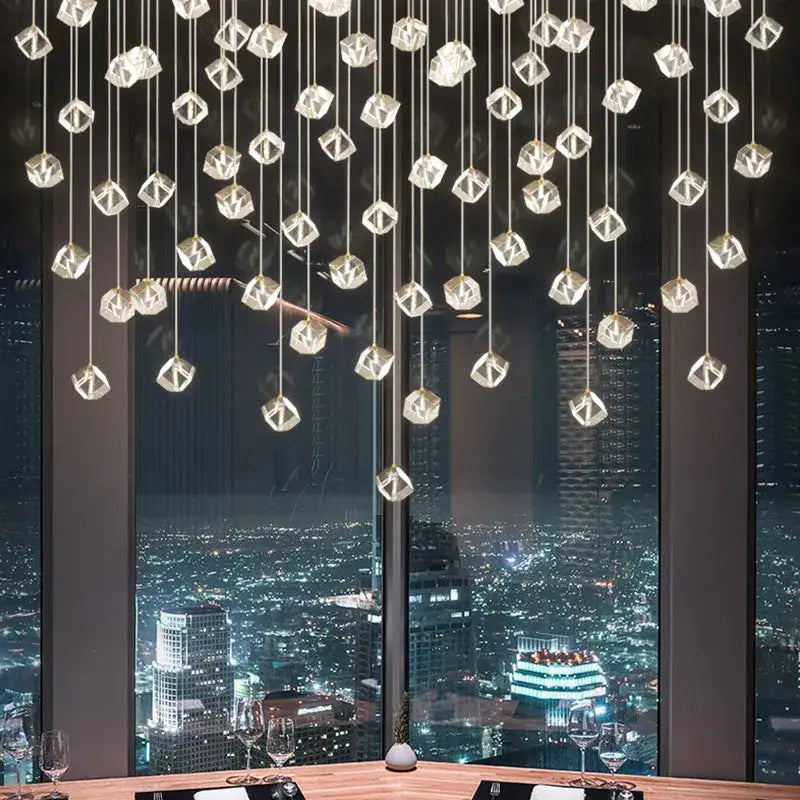 Modern geometric decorbites crystal led chandelier with crystal clear pendant lights cascading from the ceiling