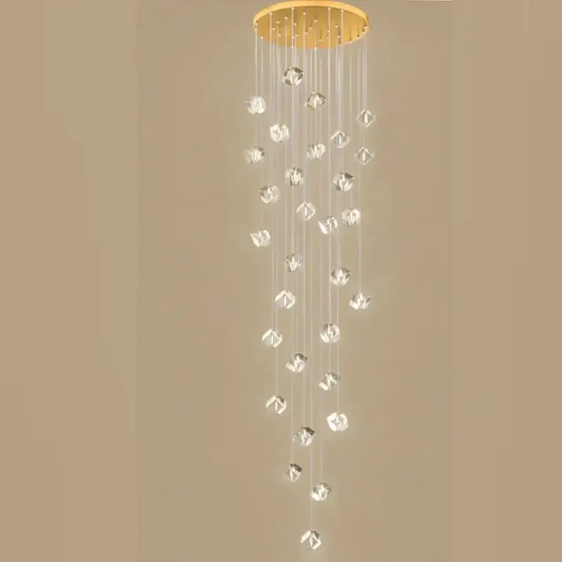 A modern decorbites crystal led chandelier with gold circular mount and cascading clear faceted beads for staircases