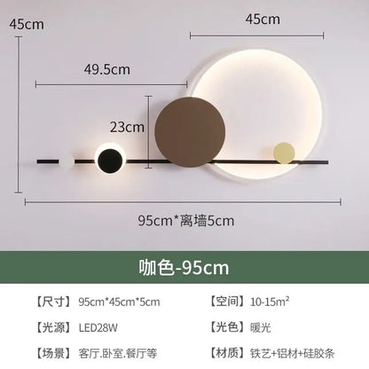 Modern geometric decorbites led wall sconce with sleek black metal bar and four circular white, brown, and gold lights