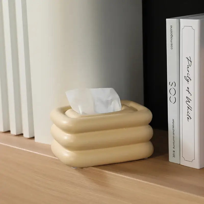 Cream-colored ceramic tissue box with layered geometric fringe design for modern living room desktop decorbites geometric fringe