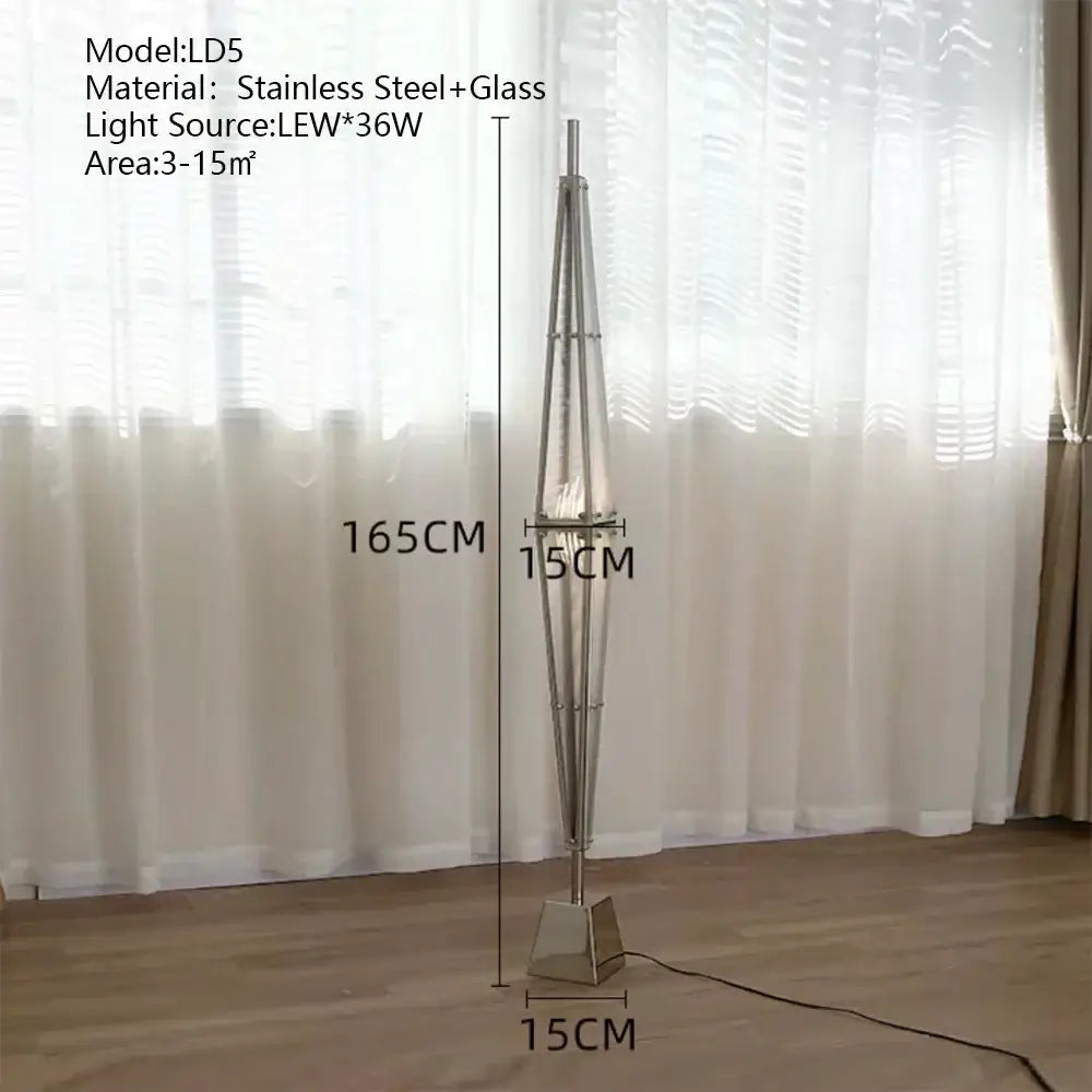 Modern stainless steel and glass cone pendant lamp with a sleek geometric design for dining room lighting