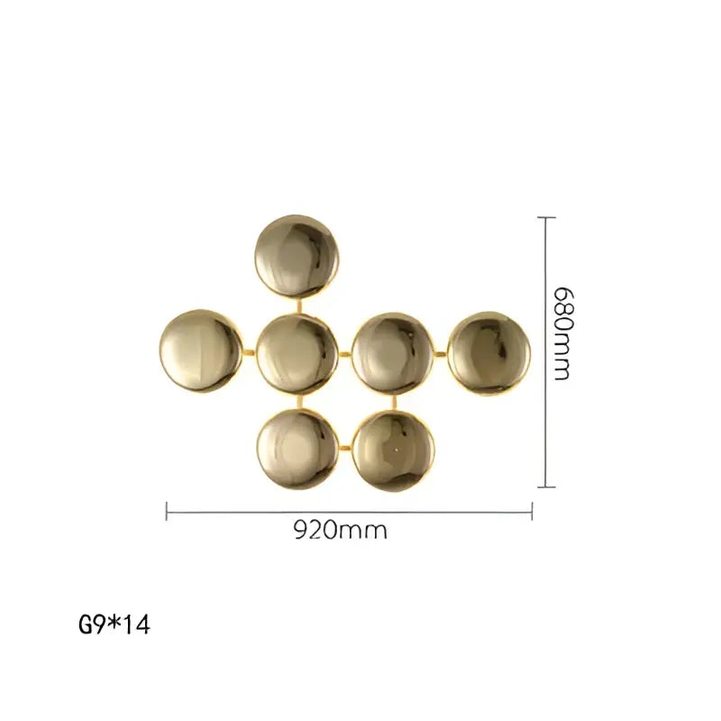 Modern geometric glossy gold led wall sconces featuring gold-toned metallic sphere arrangement for living room decor