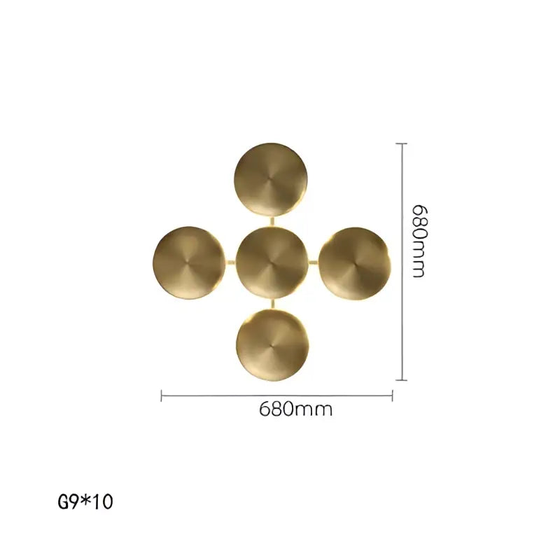 Gold-colored brass wall sconces with five circular discs in a cross pattern for modern glossy gold led wall decor