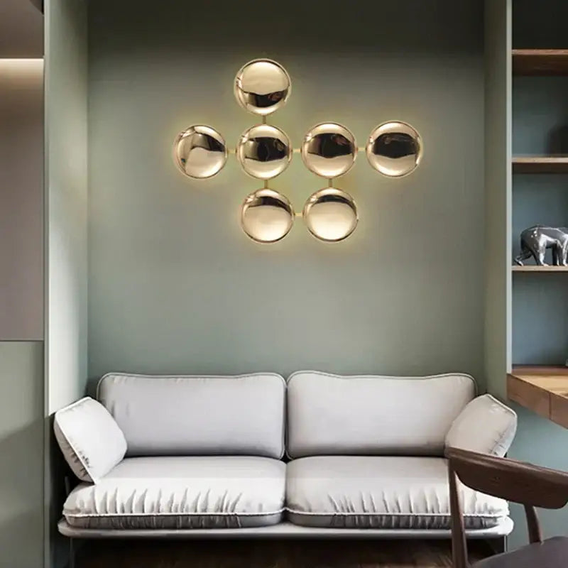 Modern geometric glossy gold led wall sconces with gold-toned spherical design for living room art decor
