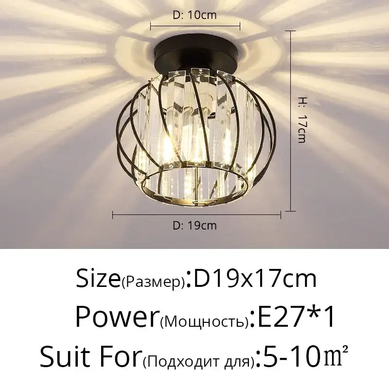 Modern geometric gold and black crystal glass LED chandelier with wireframe cage creating radiant sunburst decorbites crystal glass