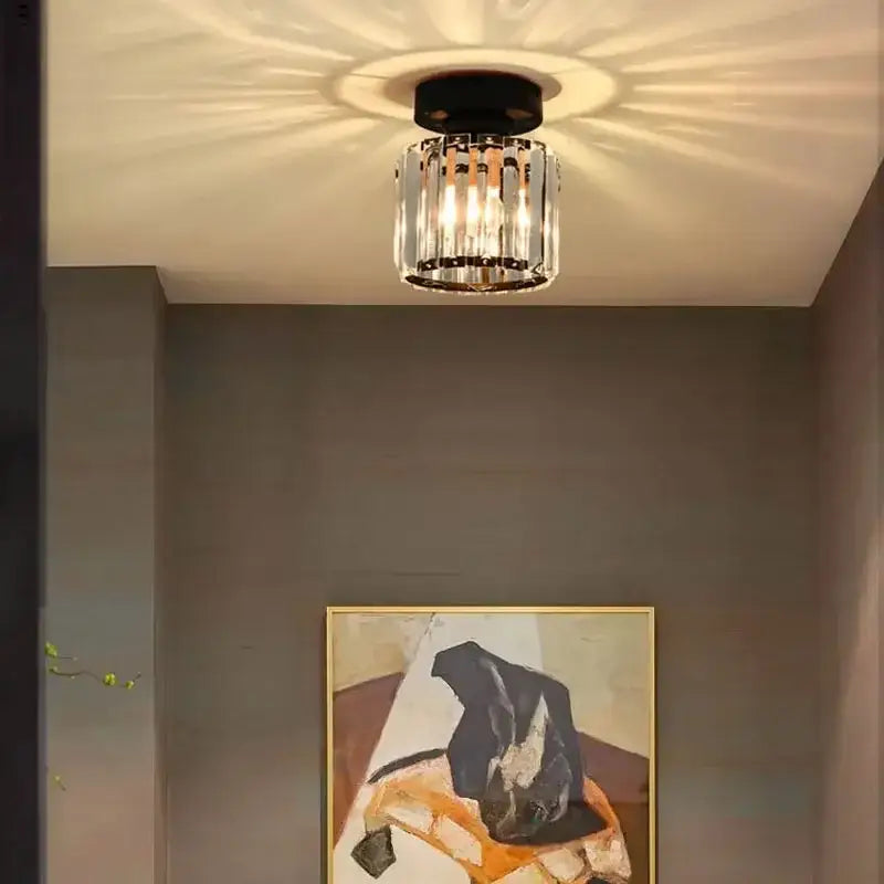 A modern geometric gold and black crystal glass led chandelier with clear faceted rods for living room decorbites crystal glass