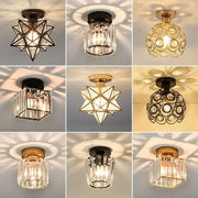 Modern geometric gold and black crystal glass led chandelier featuring star spherical and rectangular designs for living room decorbites crystal glass