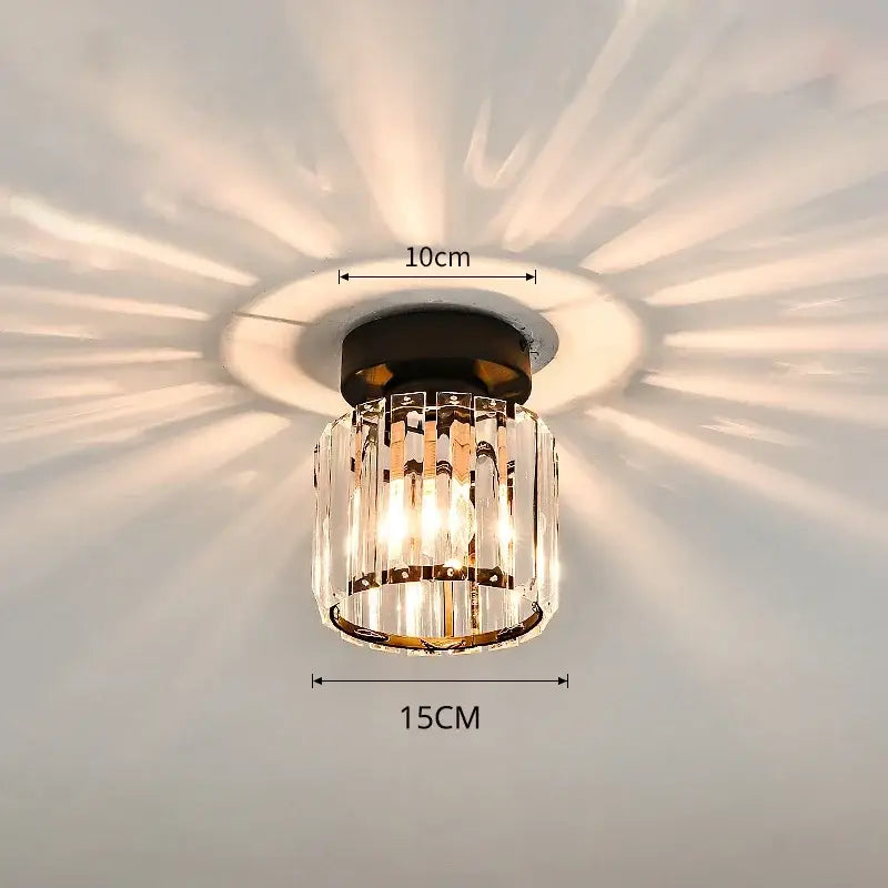 A modern geometric gold and black crystal glass led chandelier with vertical crystal prisms for living room decorbites crystal glass