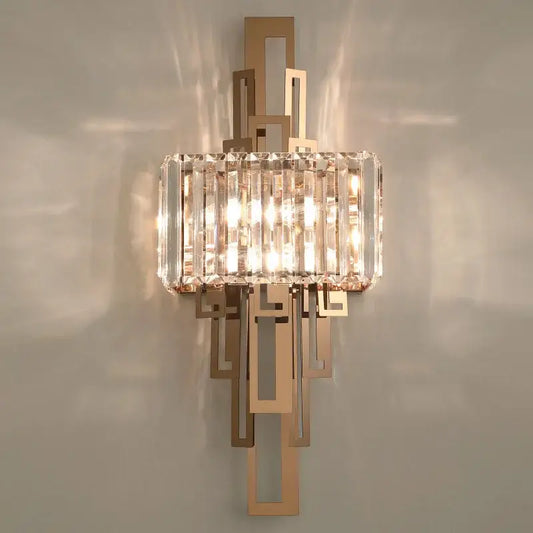 A modern geometric gold wall lamp with clear crystal rods decorbites crystal wall lamp for bedroom decor