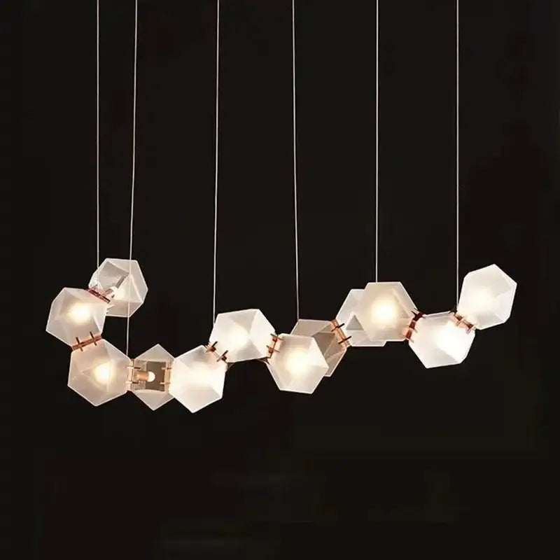 Modern geometric gold pendant light with translucent white hexagonal e14 led glass shades and copper connectors for dining room