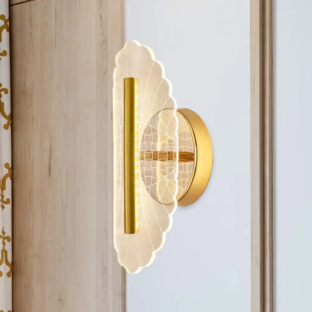 Modern geometric gold sconce light with scalloped translucent acrylic shade and illuminated led strip for living room