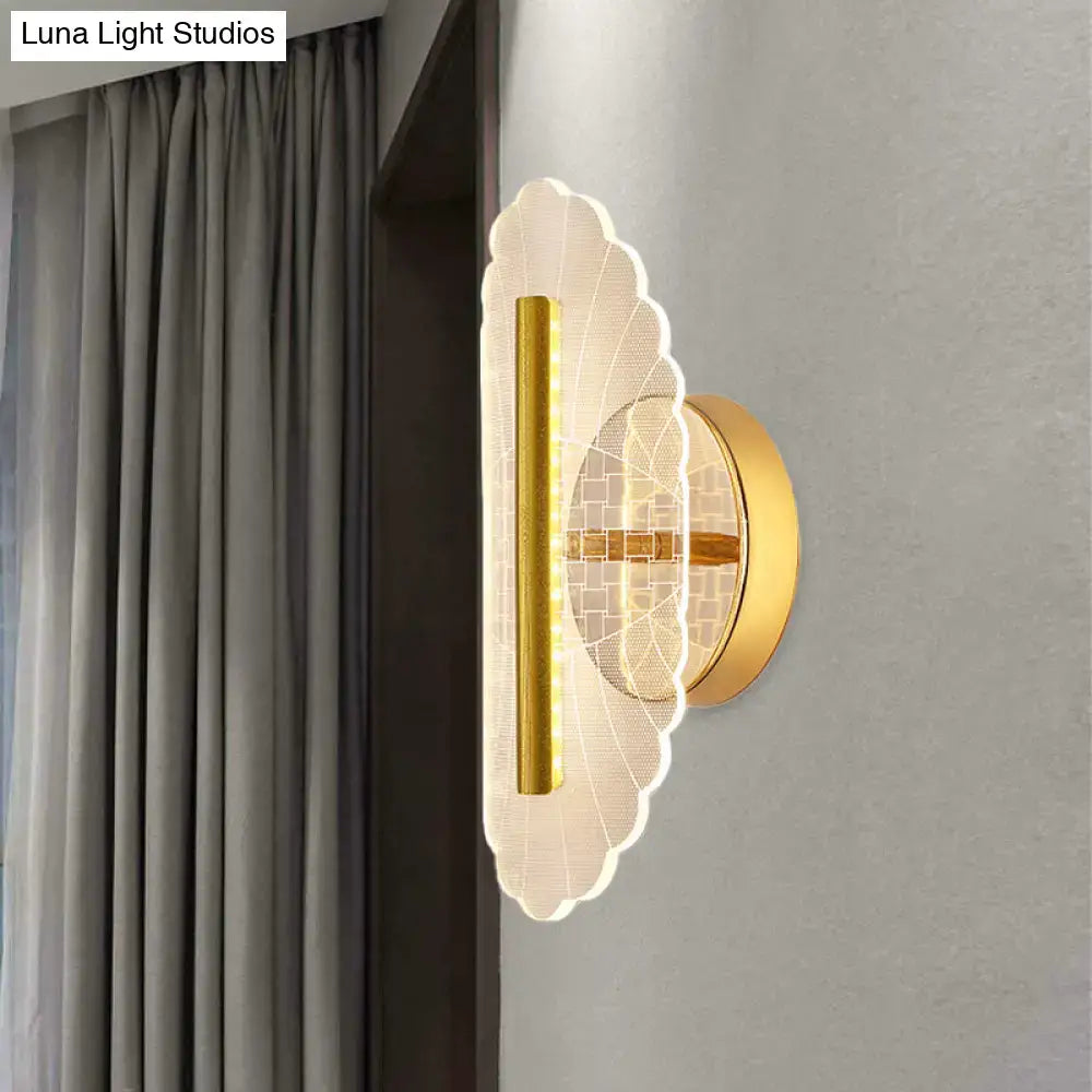 Modern geometric gold sconce light with scalloped translucent acrylic shade and vertical LED strip for living room
