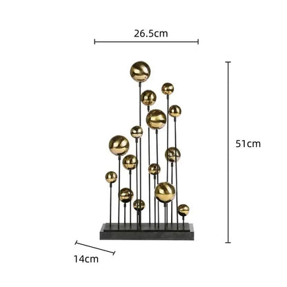 Modern geometric golden ball sculpture featuring polished gold spheres on black rods for living room decorbites decor