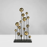 Modern geometric golden ball sculpture featuring metallic spheres on black rods for living room metal decorbites decor