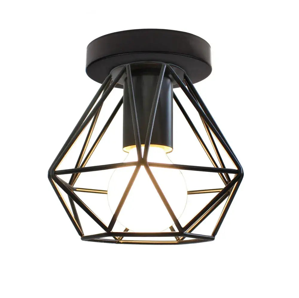 Black modern geometric iron frame cage ceiling light with warm glowing bulb for aisle and loft decorbites iron frame