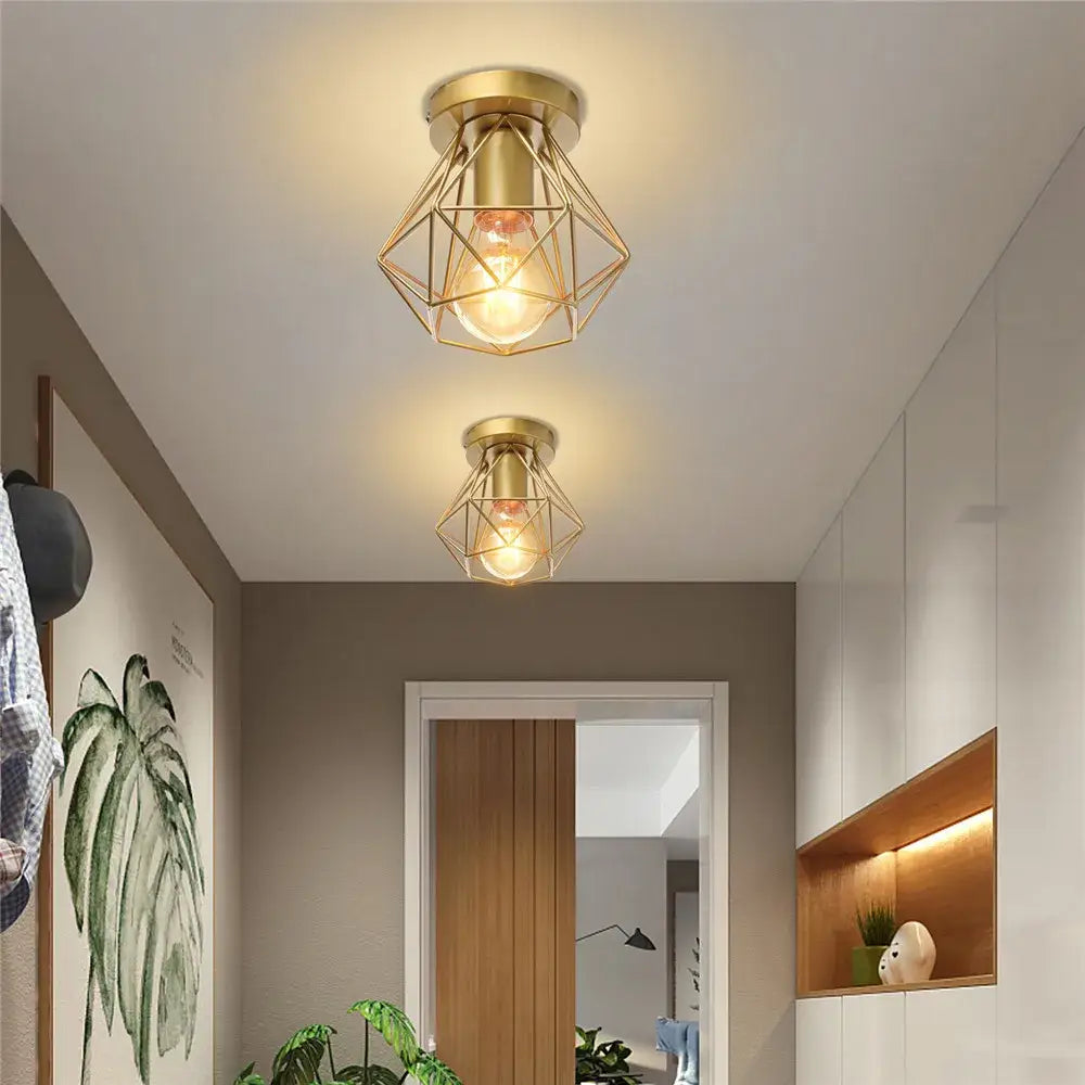 Modern geometric brass ceiling light with decorbites iron frame cage and exposed bulb for aisle and loft lighting