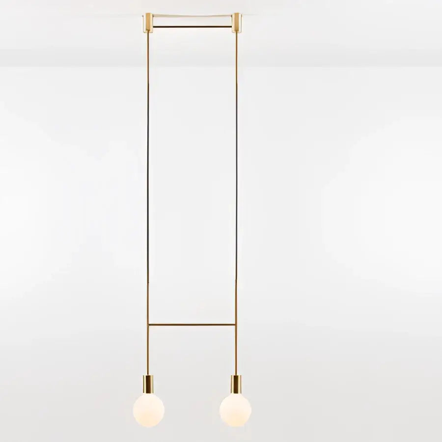 Modern geometric iron pendant light with brass frame and frosted glass bulbs for dining room decorbites geometric iron pendant
