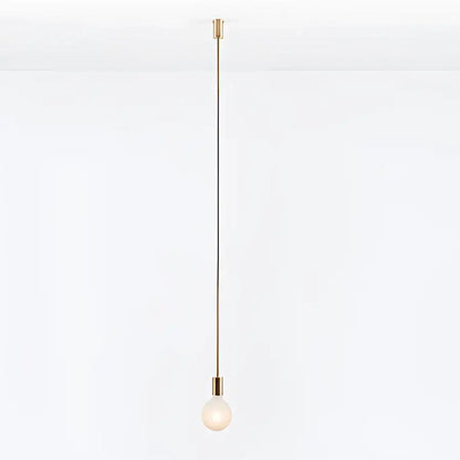 Minimalist pendant light with slender brass rod and frosted glass bulb in decorbites geometric iron pendant for dining room