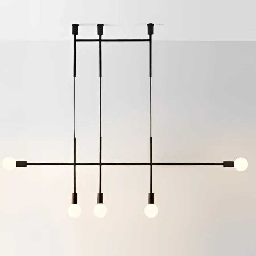 Black minimalist pendant light with six spherical bulbs in a decorbites geometric iron pendant for modern dining room decor