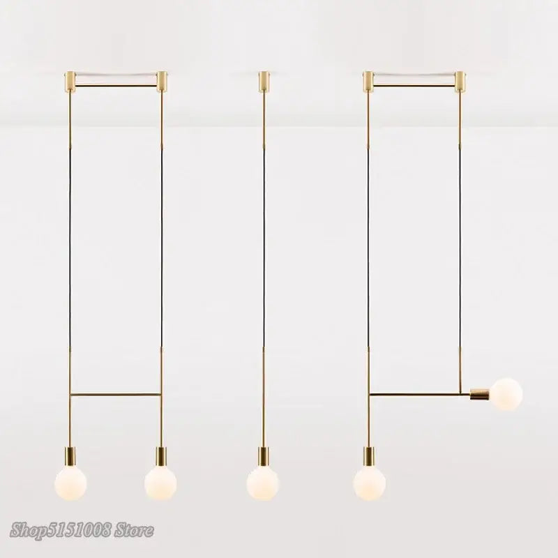 Modern geometric iron pendant light with gold-toned minimalist frames and frosted glass bulbs for dining room decorbites geometric iron pendant