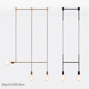 Modern geometric iron pendant light in brass and black with three exposed bulbs for dining room decorbites geometric iron pendant