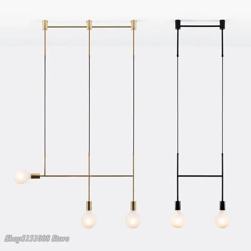 Modern geometric iron pendant light in brass and black with three exposed bulbs for dining room decorbites geometric iron pendant