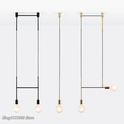 Minimalist modern geometric iron pendant light in brass and black with three bulb fixtures for dining room decorbites