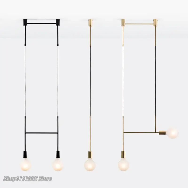 Minimalist modern geometric iron pendant light in brass and black with three bulb fixtures for dining room decorbites
