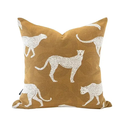Modern geometric jacquard cushion cover in mustard yellow fabric with white embroidered cheetah pattern decorbites geometric jacquard
