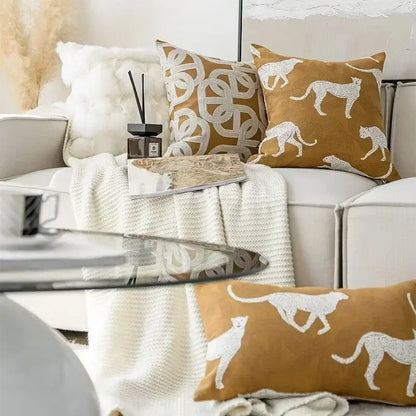 Tan cushion cover with white leopard silhouettes in textured fabric decorbites geometric jacquard cushion for living room