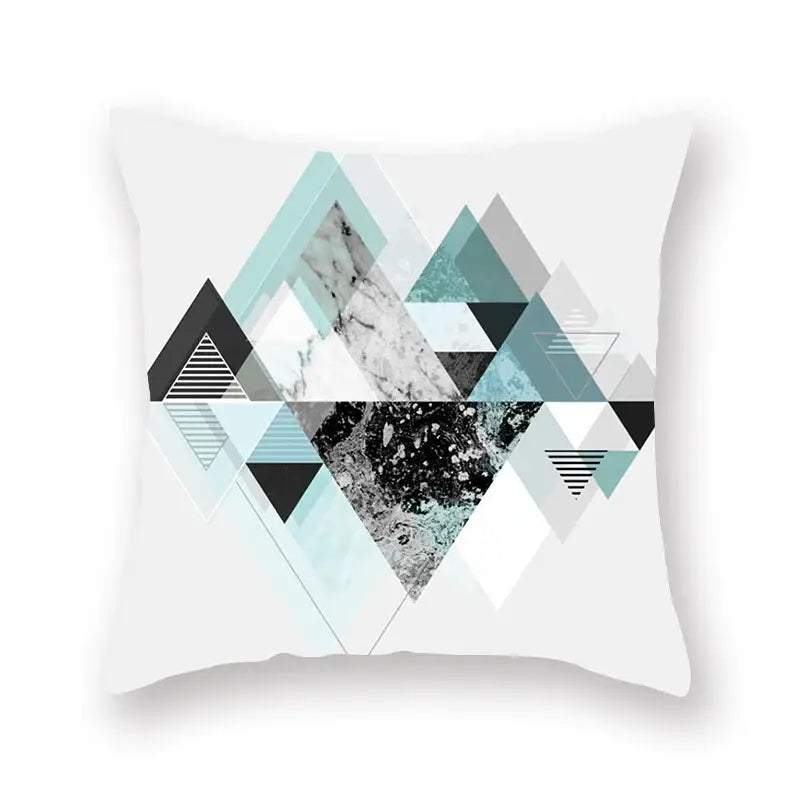 White throw pillow with modern geometric leaf flower design in teal blue marble texture for decorbites geometric leaf decor