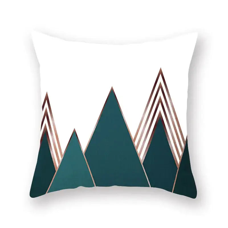 White throw pillow with modern geometric mountain design in teal and rose gold for decorbites geometric leaf decor