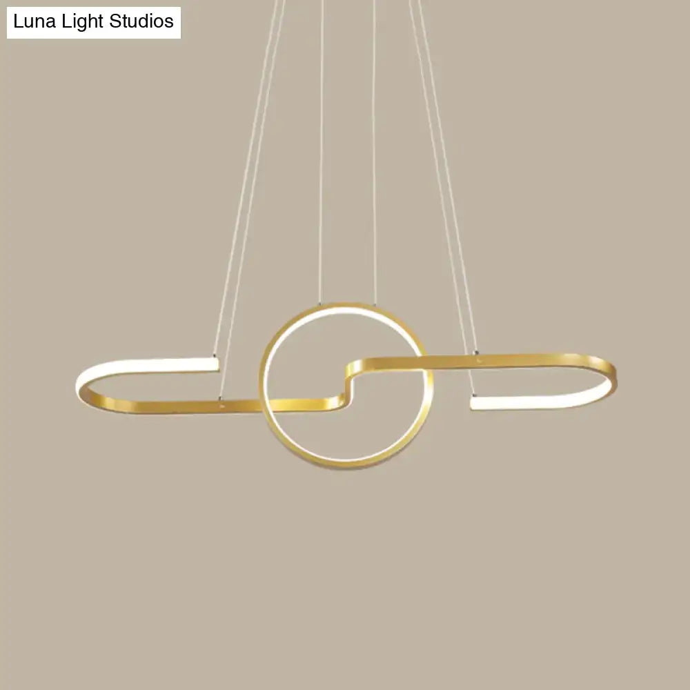 Modern black gold metal pendant light with sleek interlocking led design and warm white light for dining room island