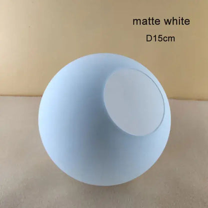 Matte white spherical lamp 15cm diameter in modern geometric magic bean lighting for smoke and amber dining room globe