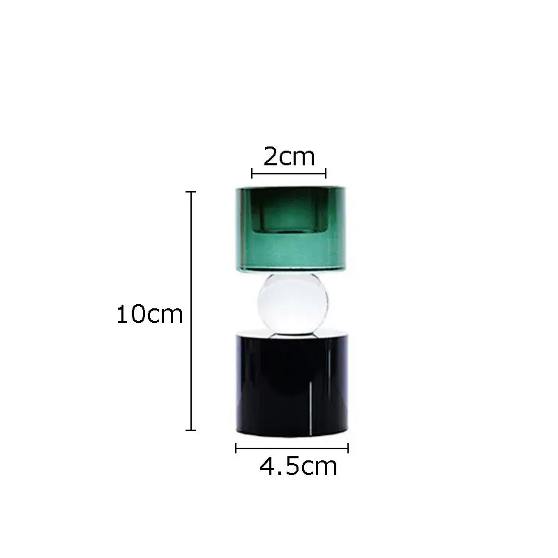 Modern geometric crystal candle holders with a matte black base and translucent green top for dining room decor