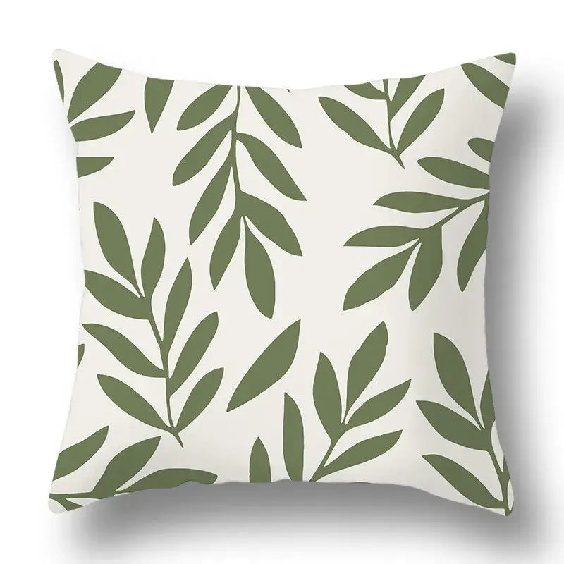 Modern geometric print pillow cover with olive green plants on white background from decorbites green plants pack