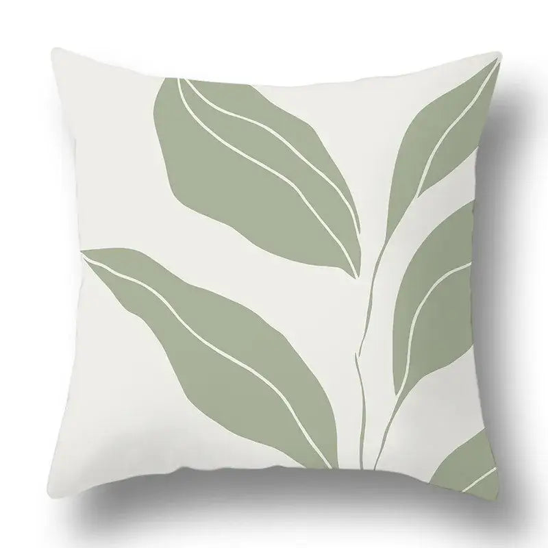 A square throw pillow cover with geometric print sage green leaves on off-white fabric for decorbites green plants decor