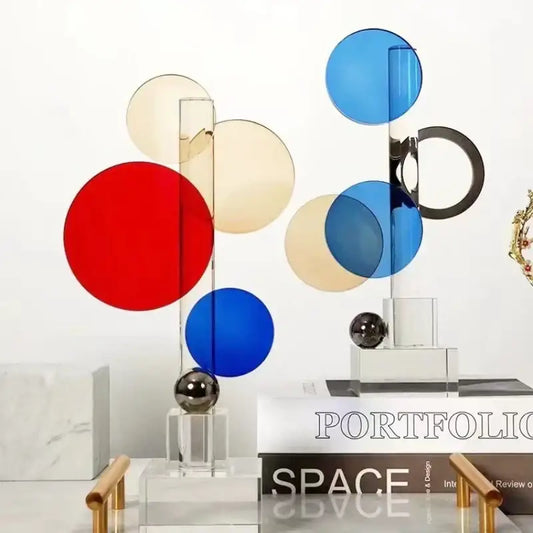 Modern geometric ring acrylic sculpture with translucent red blue beige circles and chrome spheres for home decor by decorbites crystal geometric