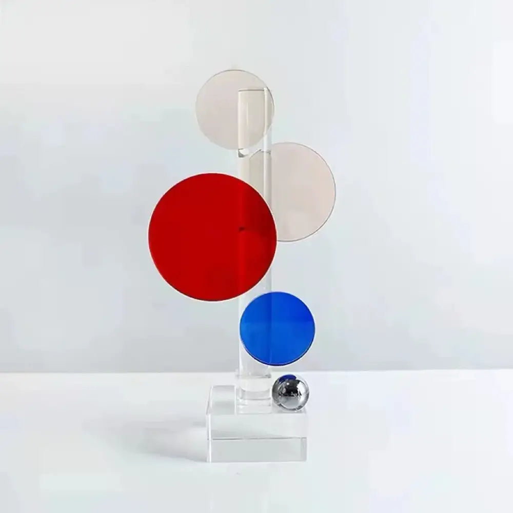 Modern geometric ring acrylic sculpture with red blue beige discs and silver sphere for home decor by decorbites crystal geometric