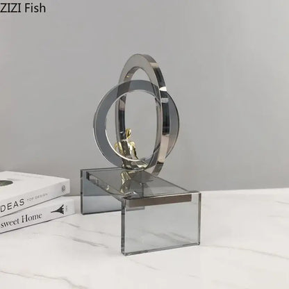 Modern geometric ring chair gold and chrome statue with interlocking rings and ring chair base on acrylic stand